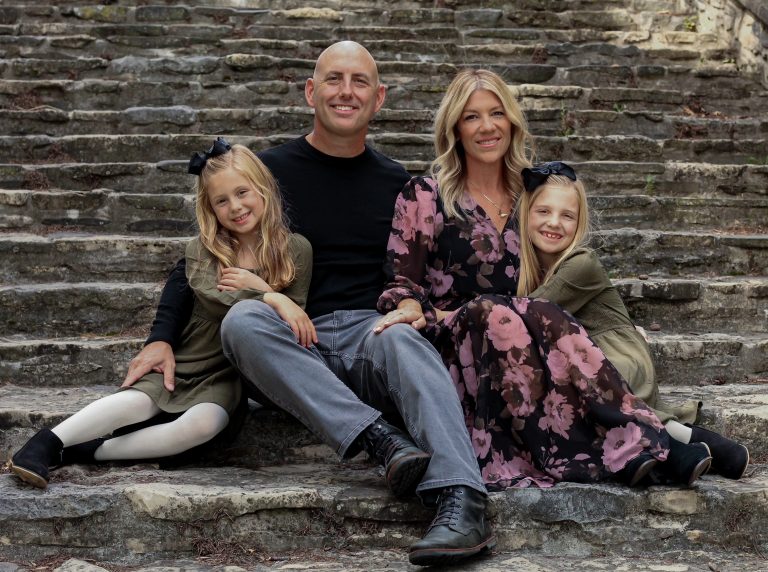 Anthony Santopolo with his family outdoors.
